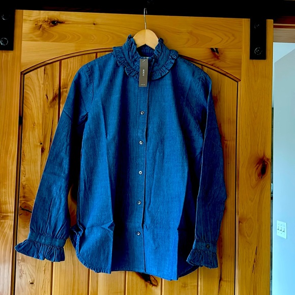 J. Crew Tops - I Crew denim blouse with ruffled collar and sleeves.
